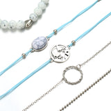 Ensemble de cinq bracelets perles rondes, perles craquelées turquoises, corde tressés carte, cercle creux métallique et à mailles argentés pour femme