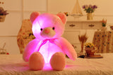 Elegante oso con luz LED y pajarita para bebé