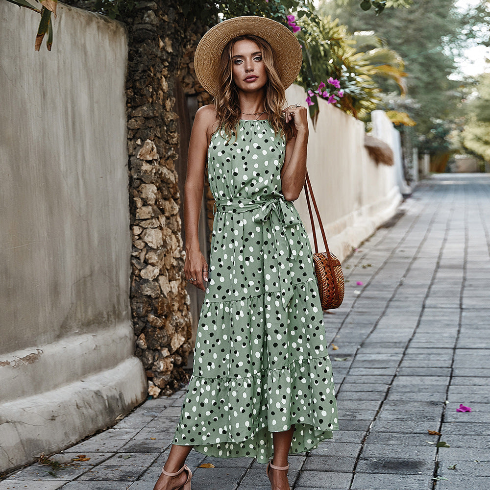 Long sleeveless dress with round neck and polka dot print for women for summer.