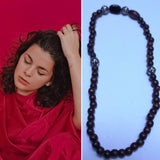 Bijou Noelya I.- Collier à 2 perles différentes à pierre noire