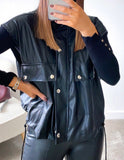 Women's black faux leather sleeveless mini jacket