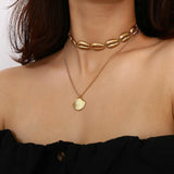 Necklace with 2 Gold chains - Shell pendants.