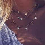 Love multi-chain necklace with star pendants - Gold Color