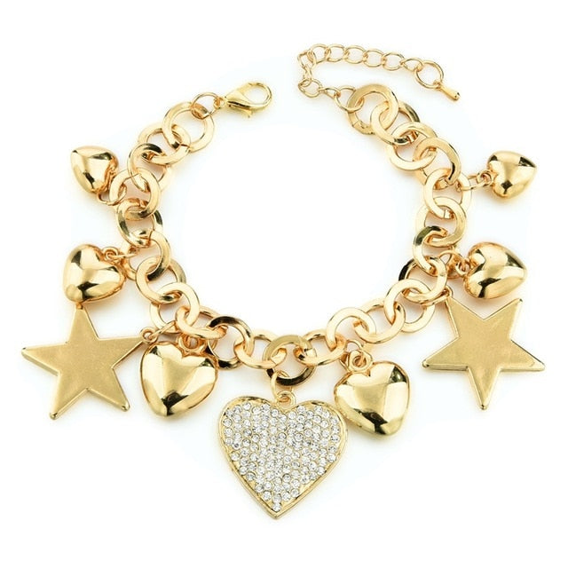 Fancy gold-colored lucky charm bracelet for women with crystal heart pendant - New in 2021