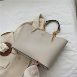 Amélie women's luxury leather tote handbag with chain handle