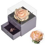 Eternal rose in its jewelry box with its surprise heart pendant necklace